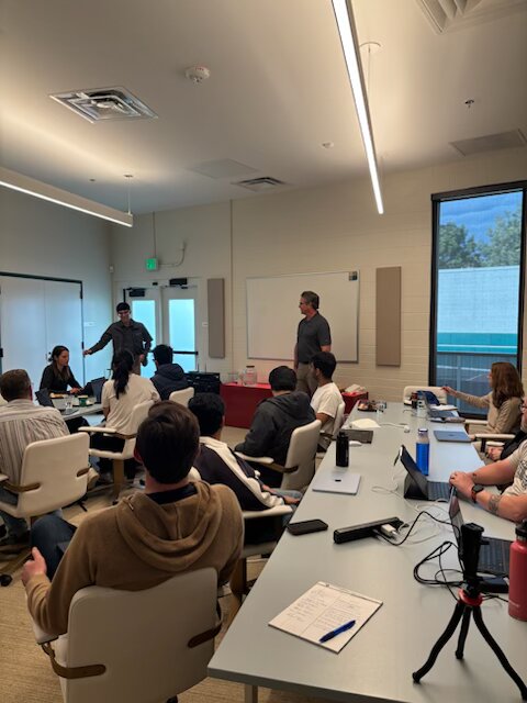 Workshop presenters addressing the group