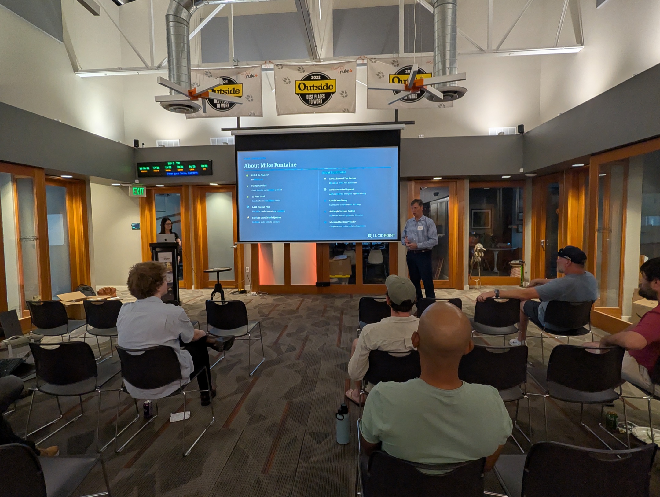 Mike Fontaine of LucidPoint introducing himself next to his About slide